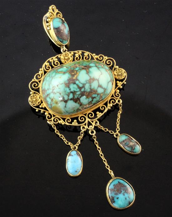 An early 20th century 15ct gold filigree and turquoise drop pendant, overall 3.25in.